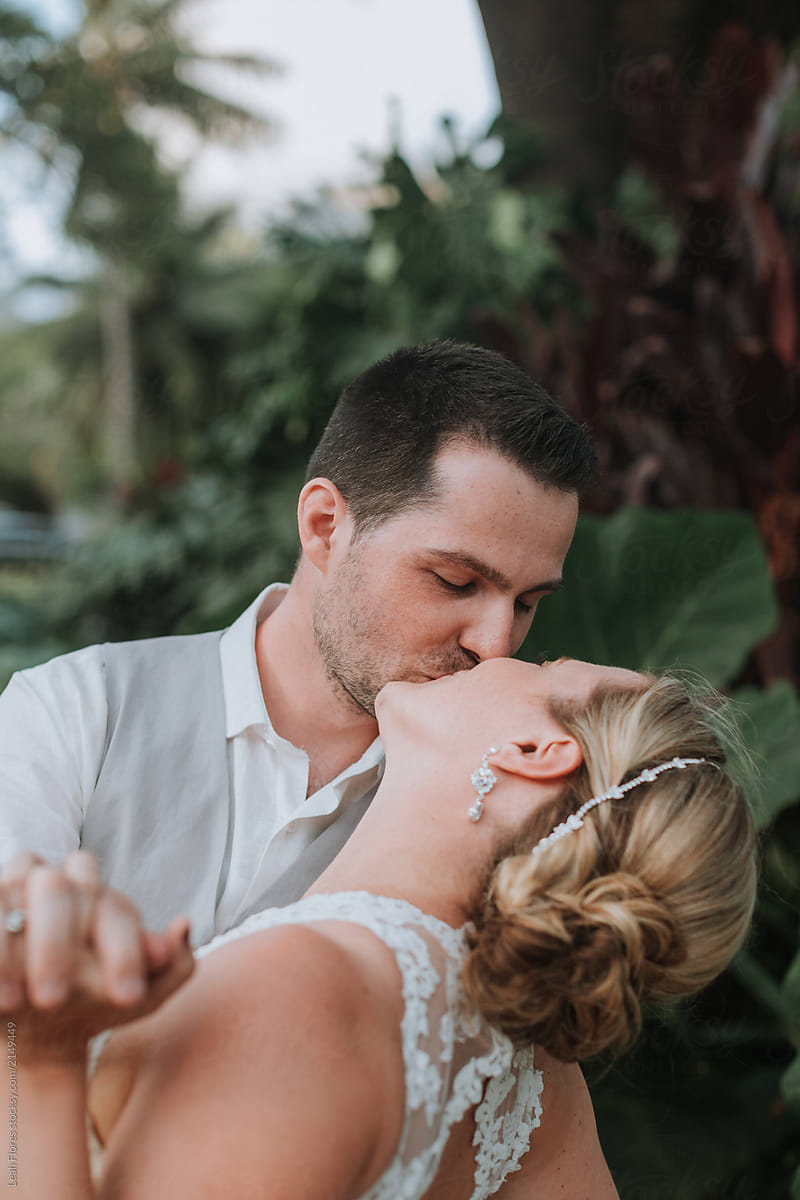 Wedding Couple Kissing By Stocksy Contributor Leah Flores Stocksy