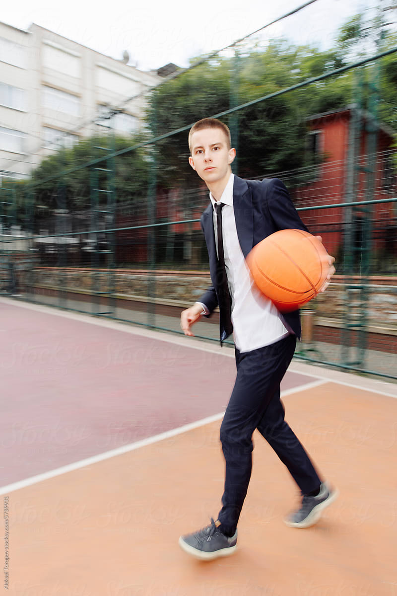 Young man on the basketball court