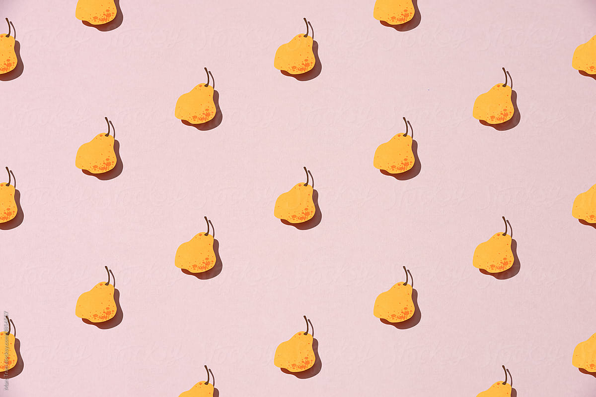 Fruit made of paper. Pink background. Flat lay. pear.