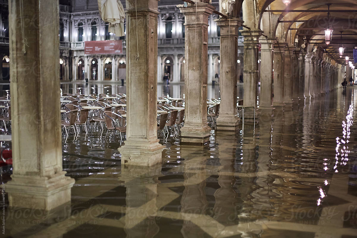 Nighttime in Venice St Marks Square, flooded paths