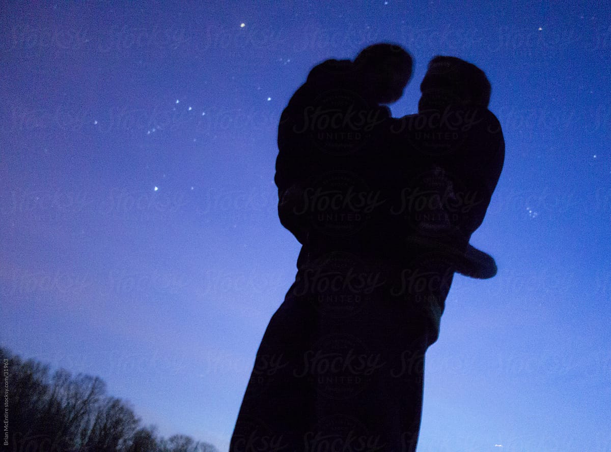 Star Gazing: Father and Son Silhouette with Orion Constellation