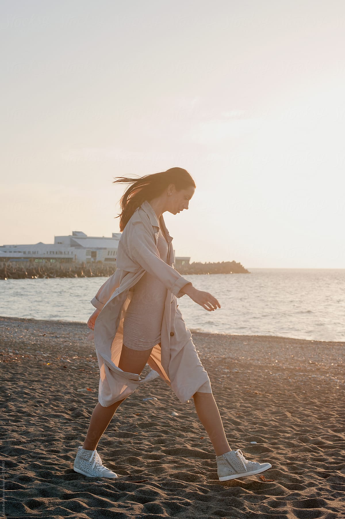 Woman Walking By The Seashore By Stocksy Contributor Amor Burakova Stocksy 7181