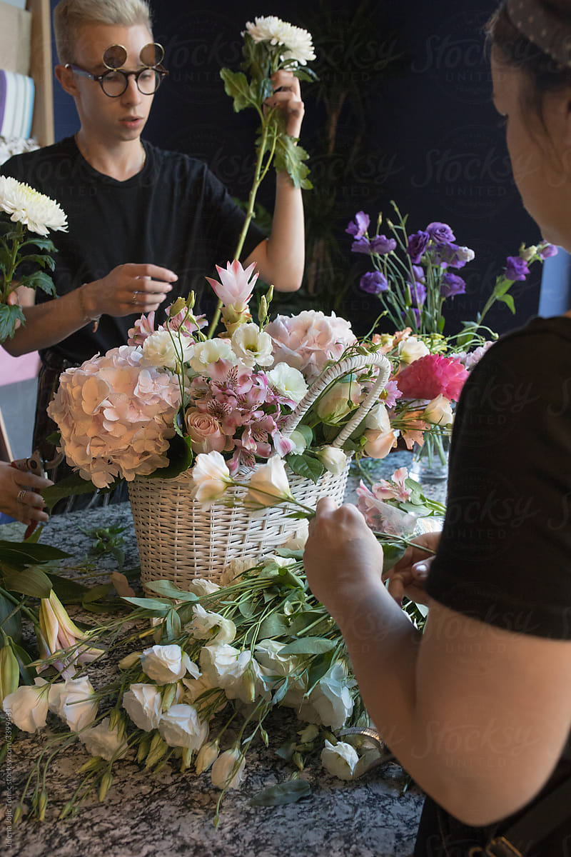 Florists at the flower shop arranging a bouquet