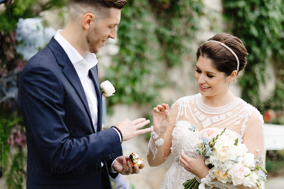Newlyweds wedding ceremony ring