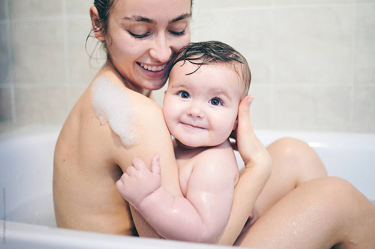 Mother and baby taking bath