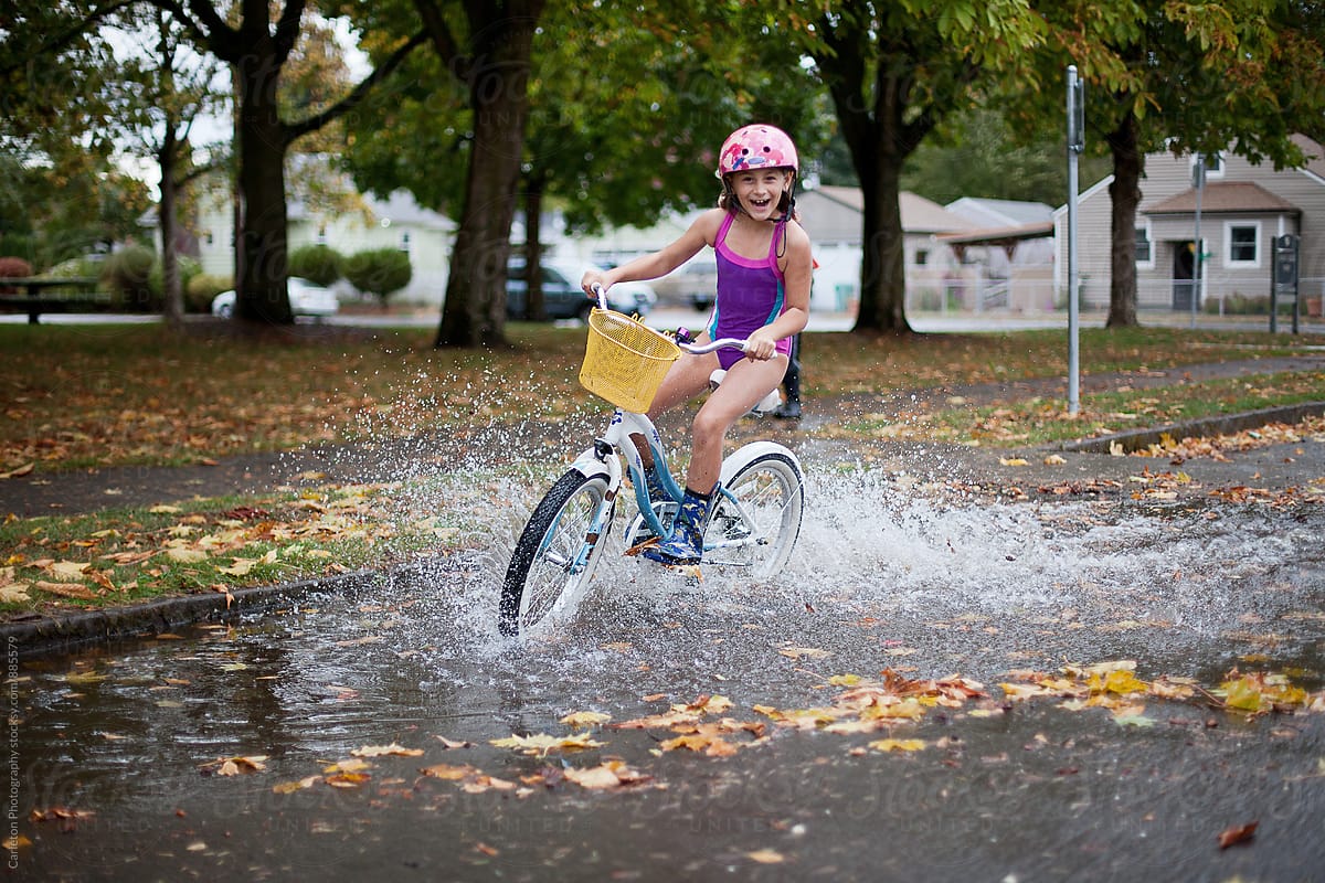 Enjoying The Rain On A Bike In Portland Oregon By Stocksy Contributor Carleton Photography