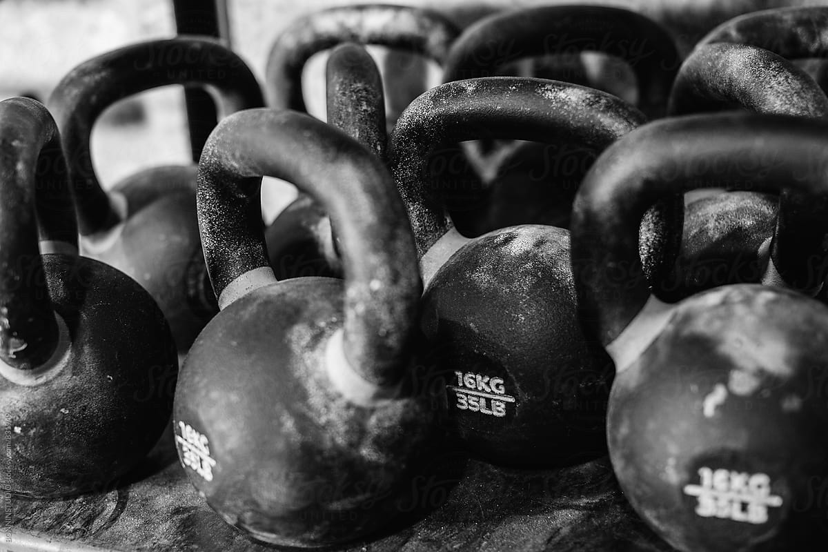 Kettlebells in a gym. Black and white photo.