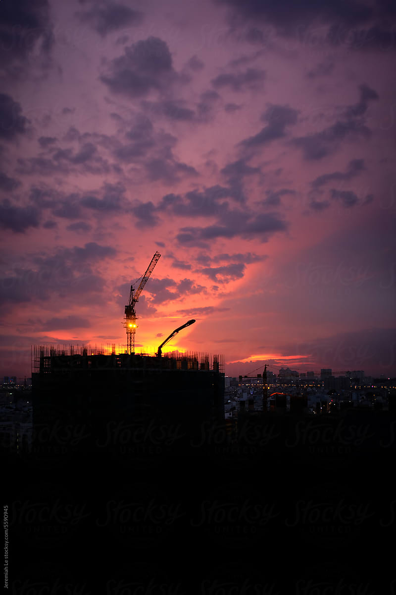 Cityscape of the constraction site in sunset