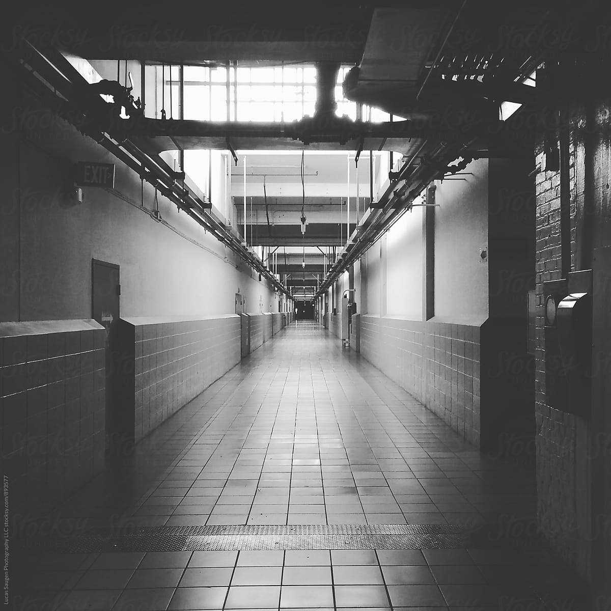 Long dark hallway in a big old building
