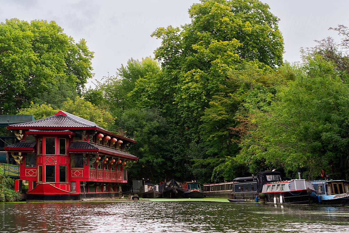 Chinese pagoda on the river and motorboats