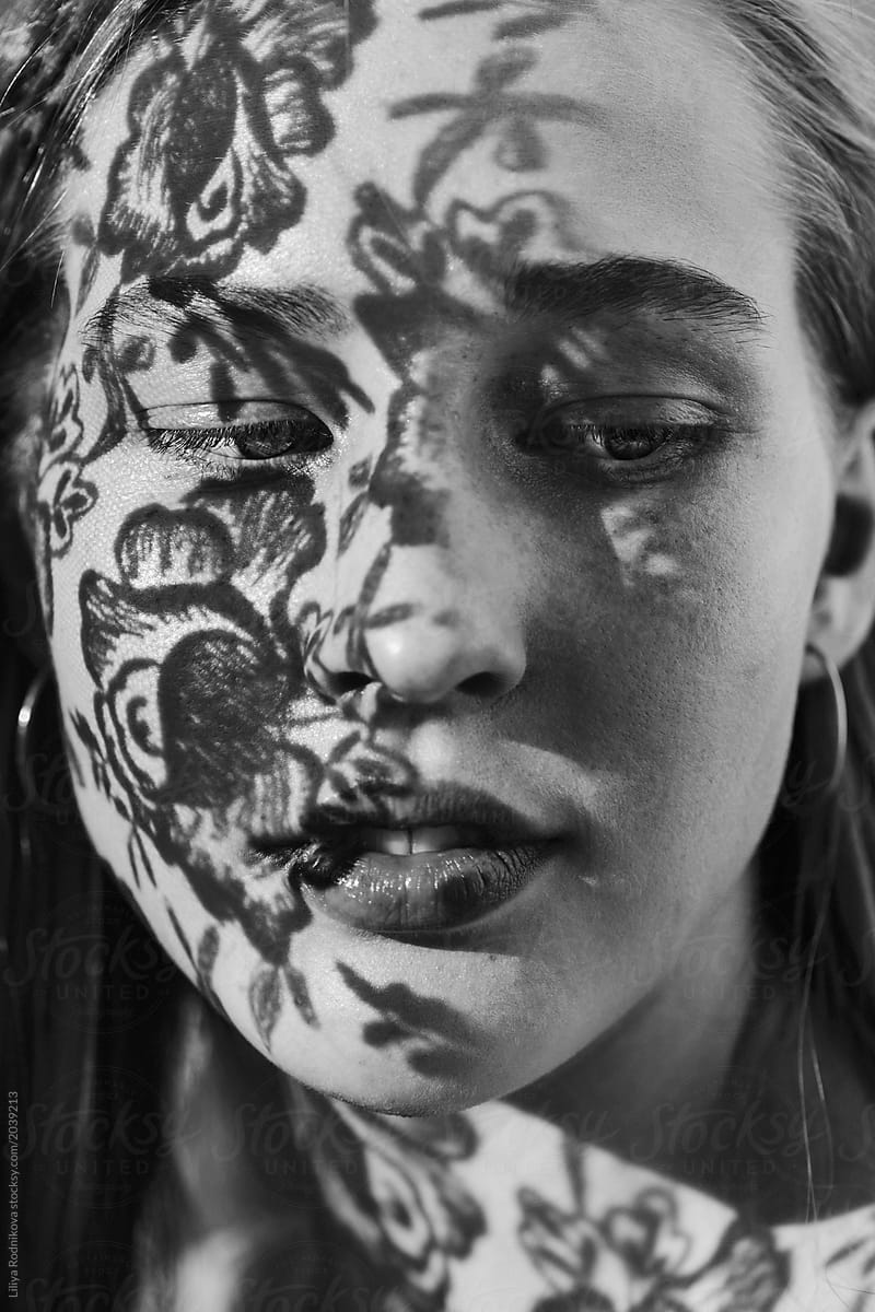 Monochrome Closeup Portrait Of Amazing Girl With Floral Shadows On Her Face By Stocksy 2005