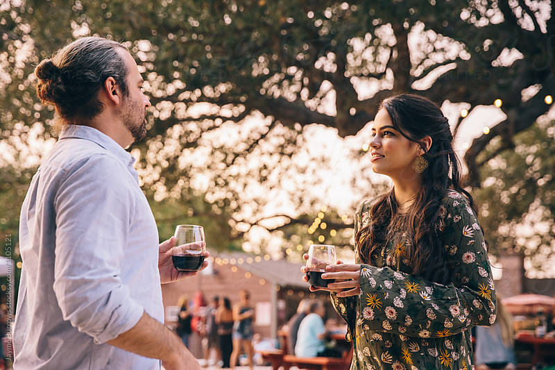 Man and Woman Chatting at a Wine Party in a Vineyard