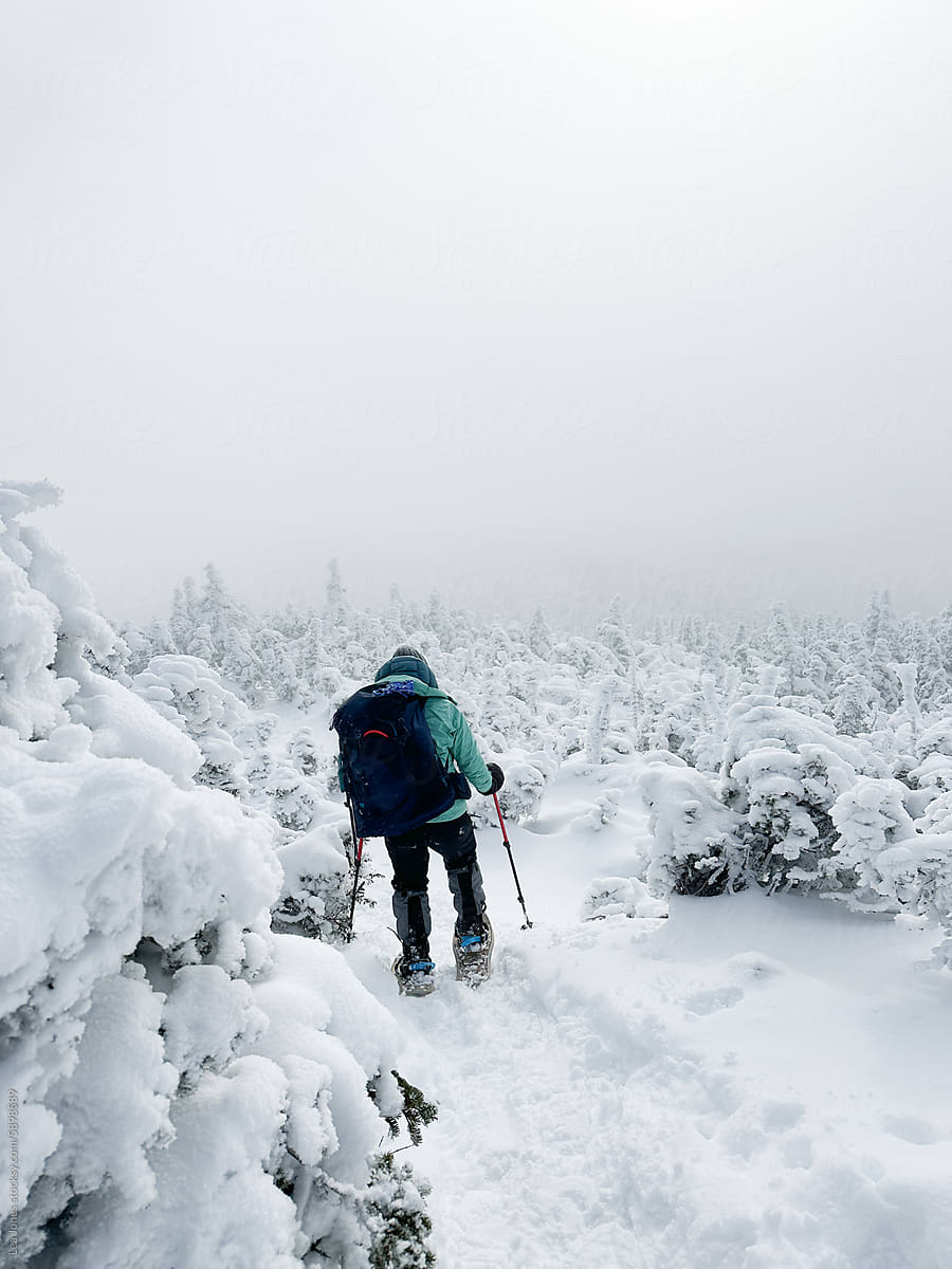 UGC of person hiking in frozen landscape in White Mountains NH