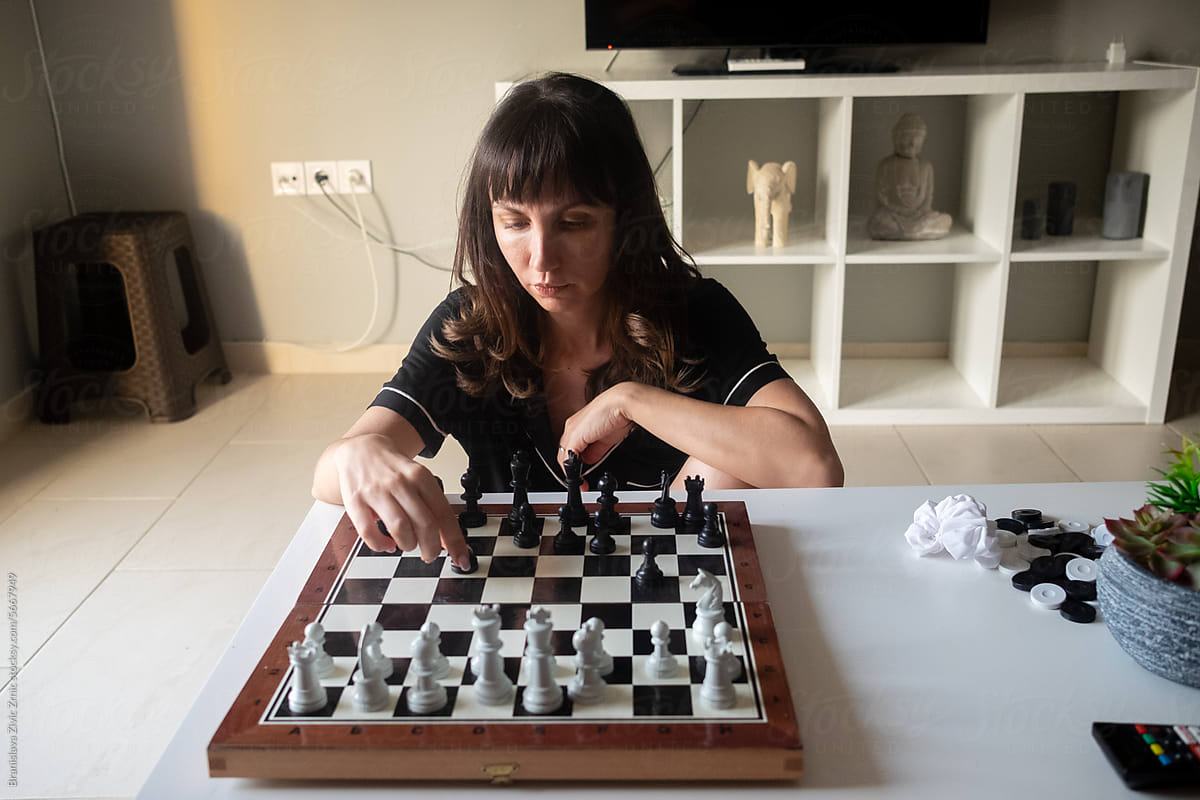 Female playing chess