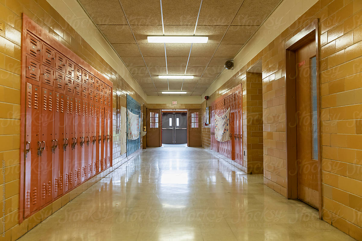 Lockers line Long hallway interior at School