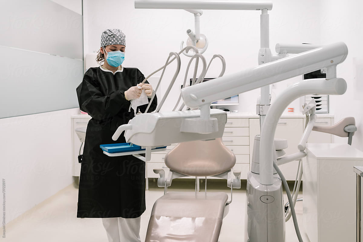 Assistant cleaning the dental hospital