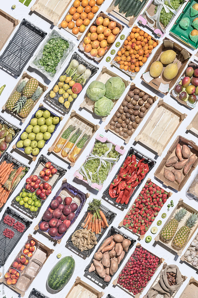 colorful fruity mosaic made of wooden crates with fruit