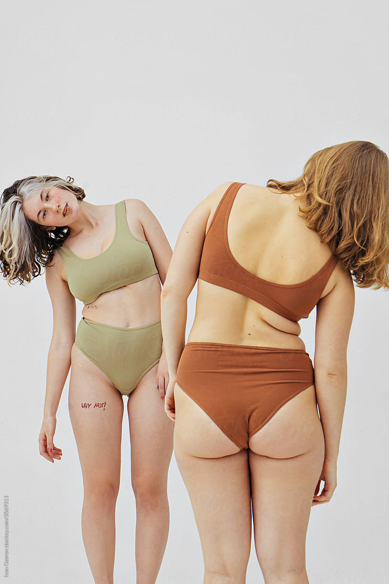 Diverse Women In Underwear Doing Yoga by Stocksy Contributor Ivan Ozerov  - Stocksy