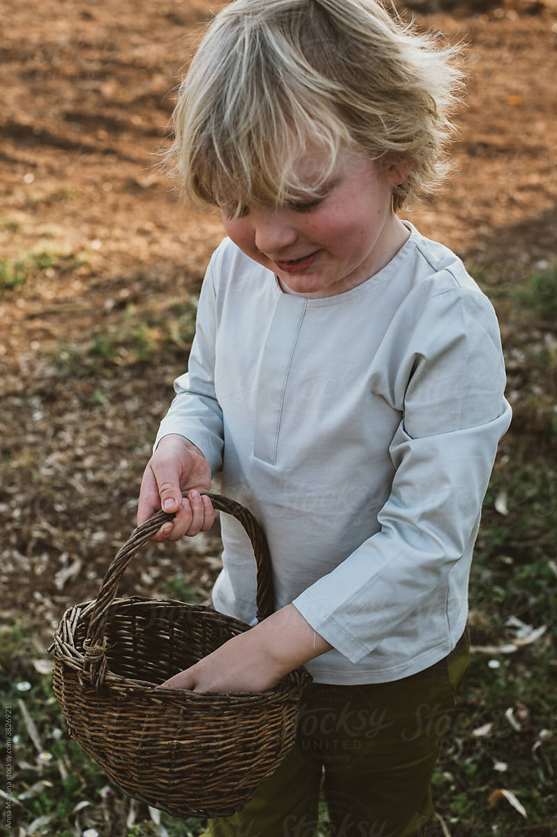 smiling Toddler Boy Easter Egg Hunt