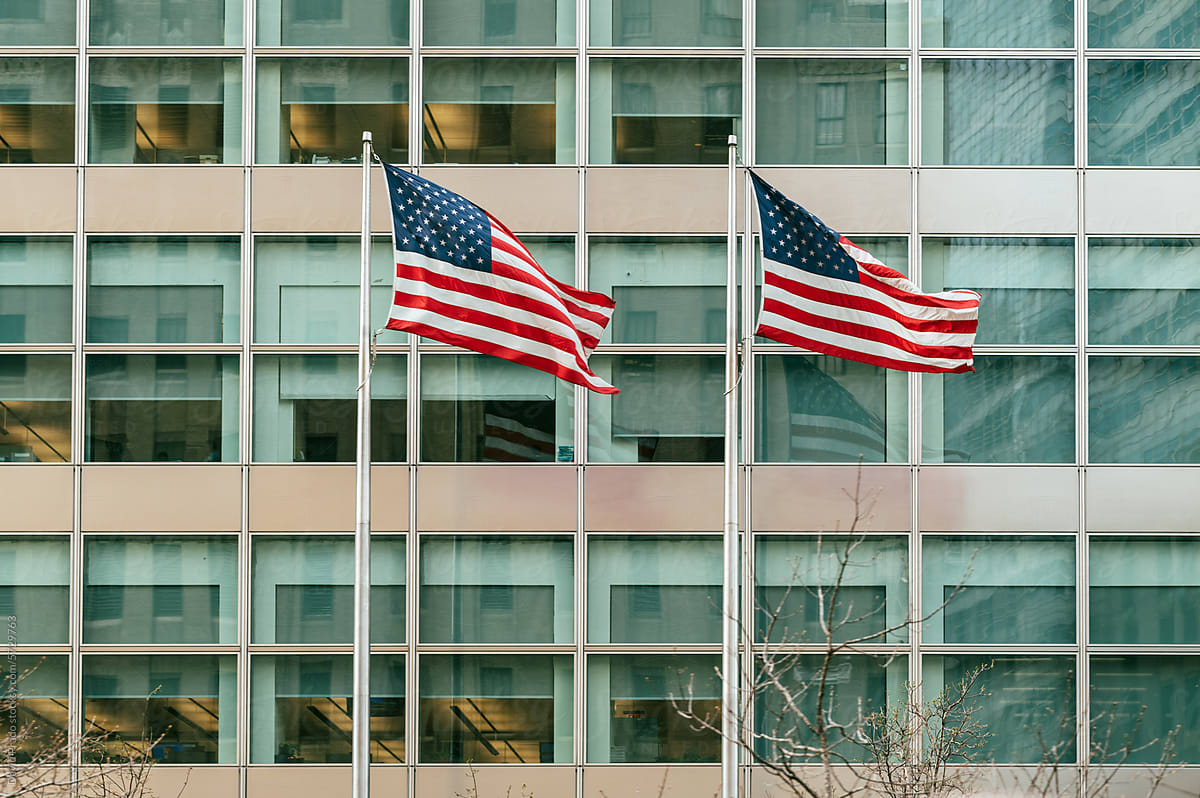 American flags in front of a Manhattan building