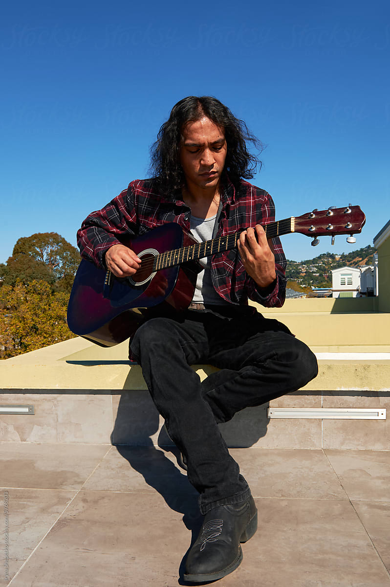 Guitar Man on rooftop