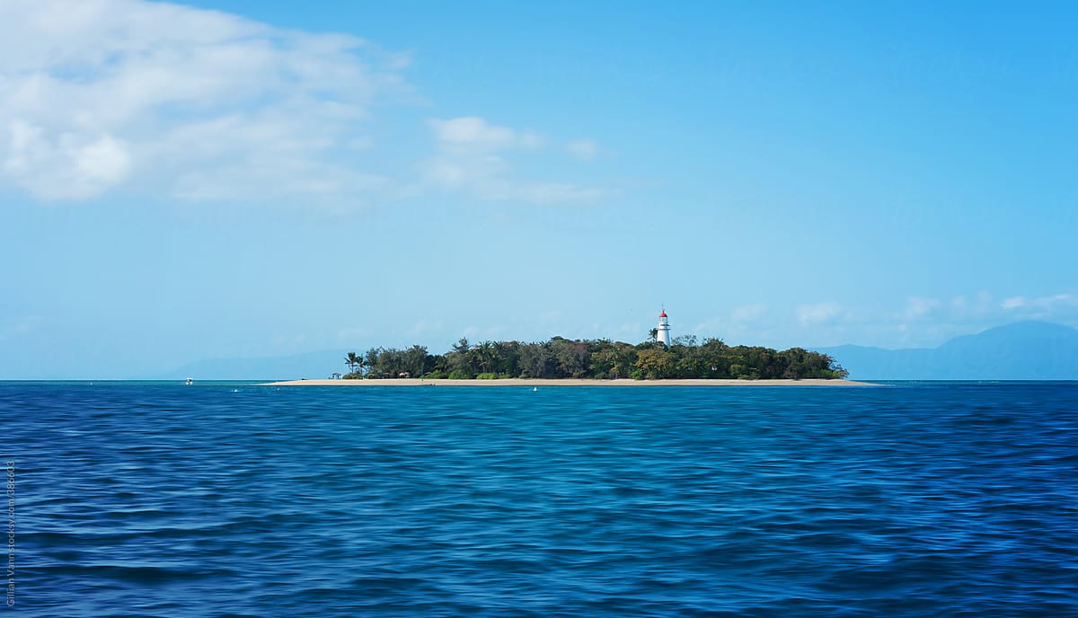 idyllic island with lighthouse, heading out to the reef, Queensland, Australia