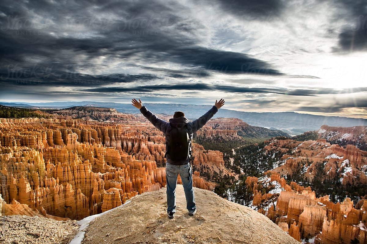 Man greets the world at dawn at the Bryce Canyon Utah