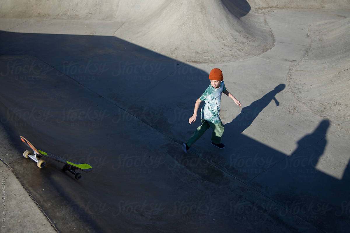 Teen skater in a bowl
