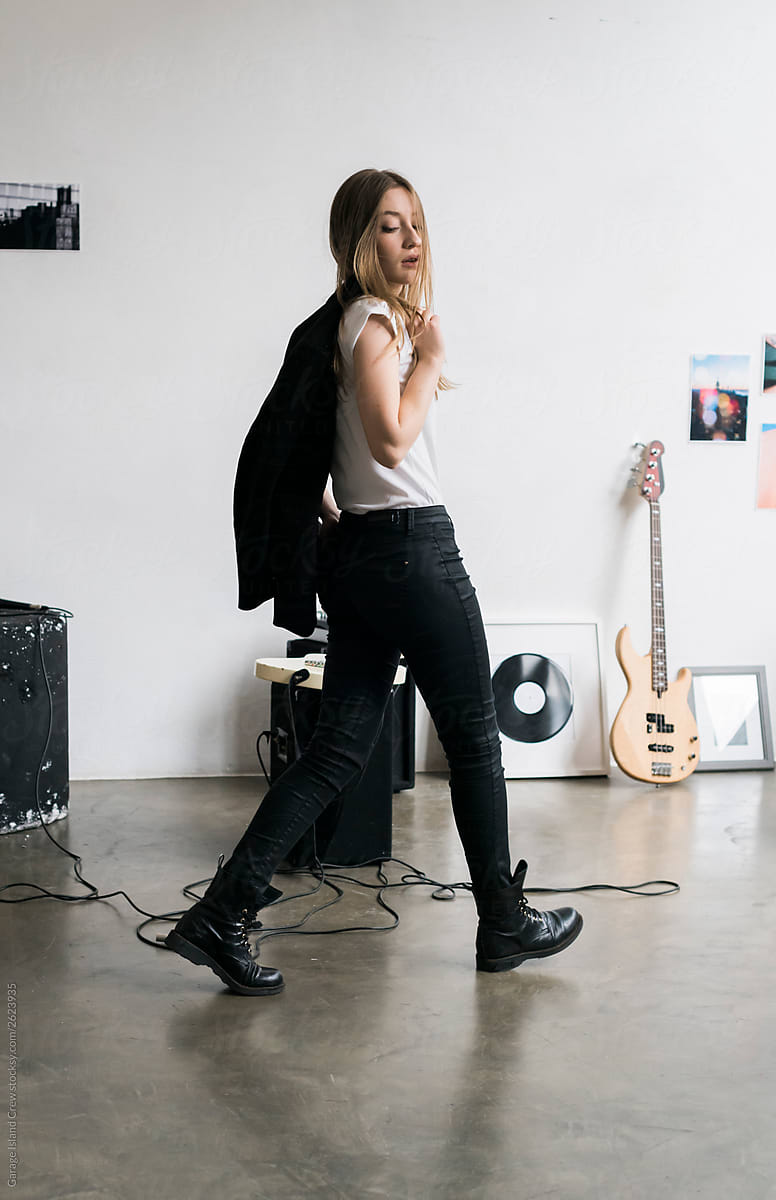 Cool young woman in rehearsal room