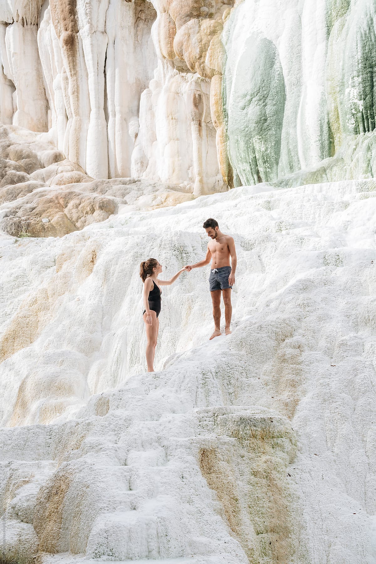 couple relaxing in natural hot springs