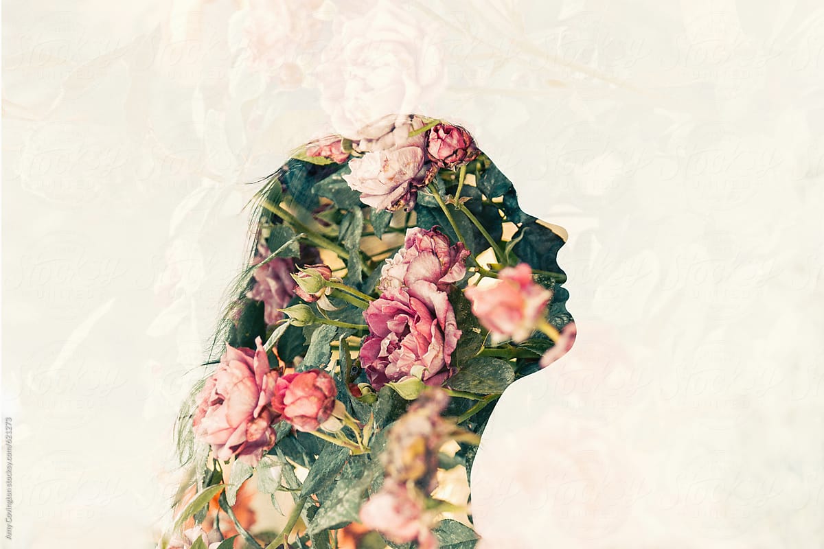 Double exposure of young woman and pink roses