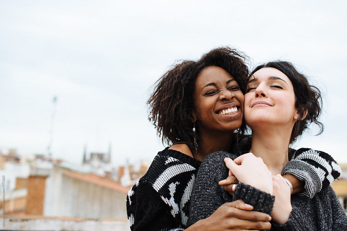 Affectionate Embrace Between Two Female Friends By Stocksy Contributor Michela Ravasio Stocksy 