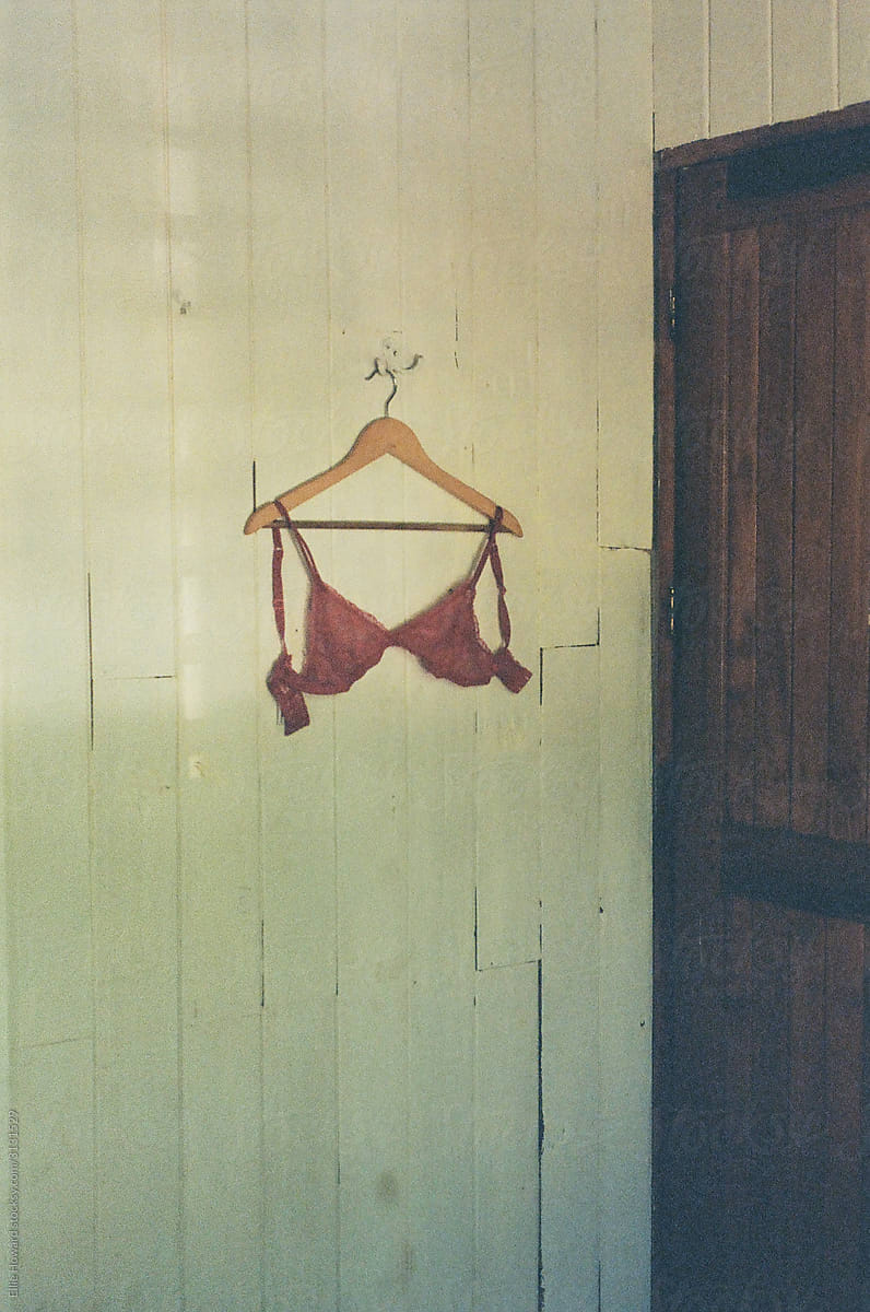 Moody lingerie hanging in beach house