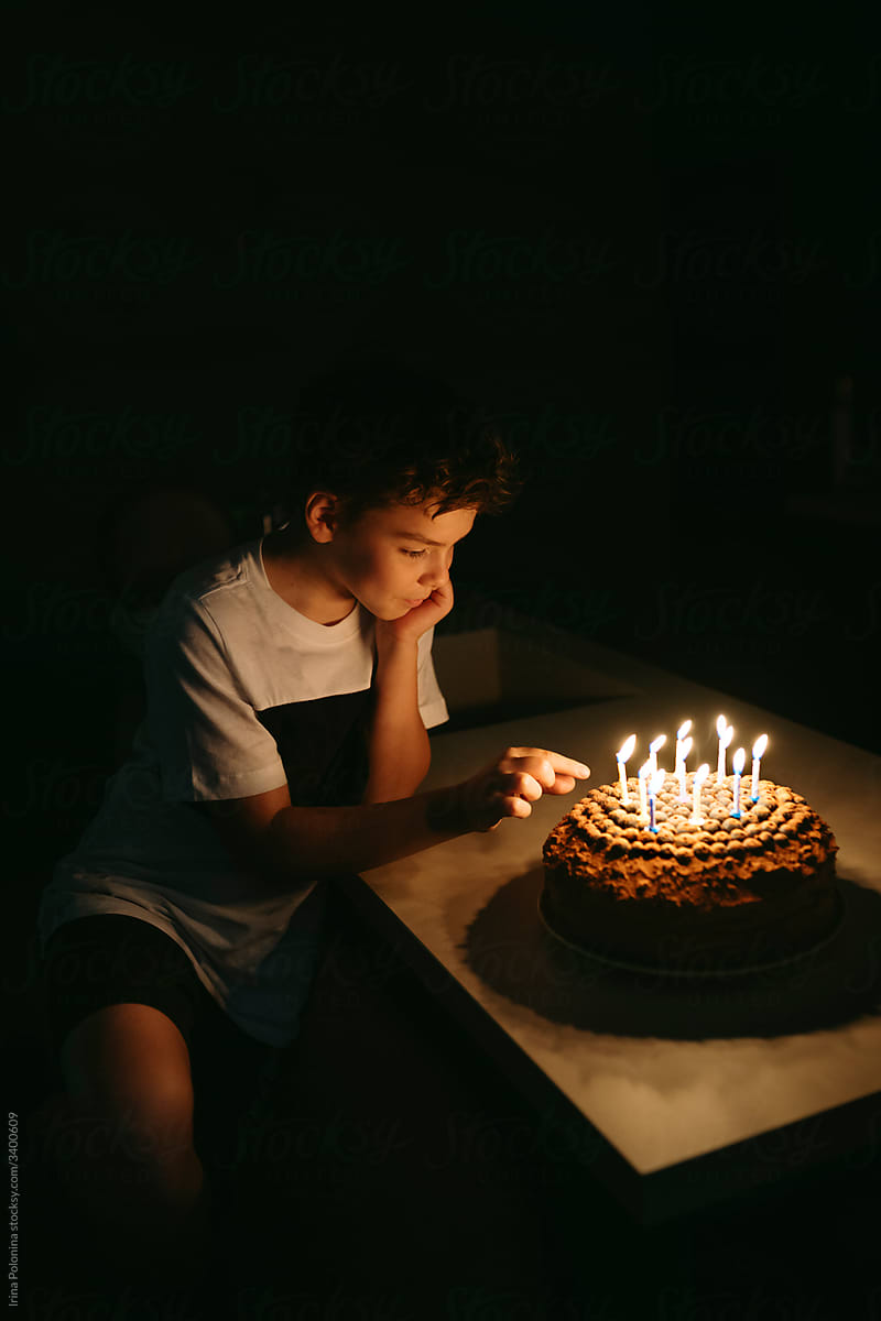A young boy celebrates his birthday.