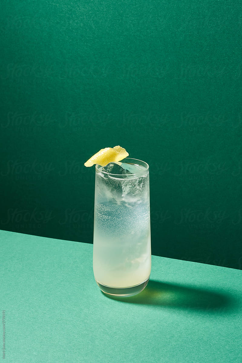 Refreshing cocktail with lemon zest