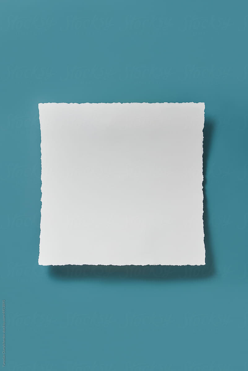 White paper on blue background.