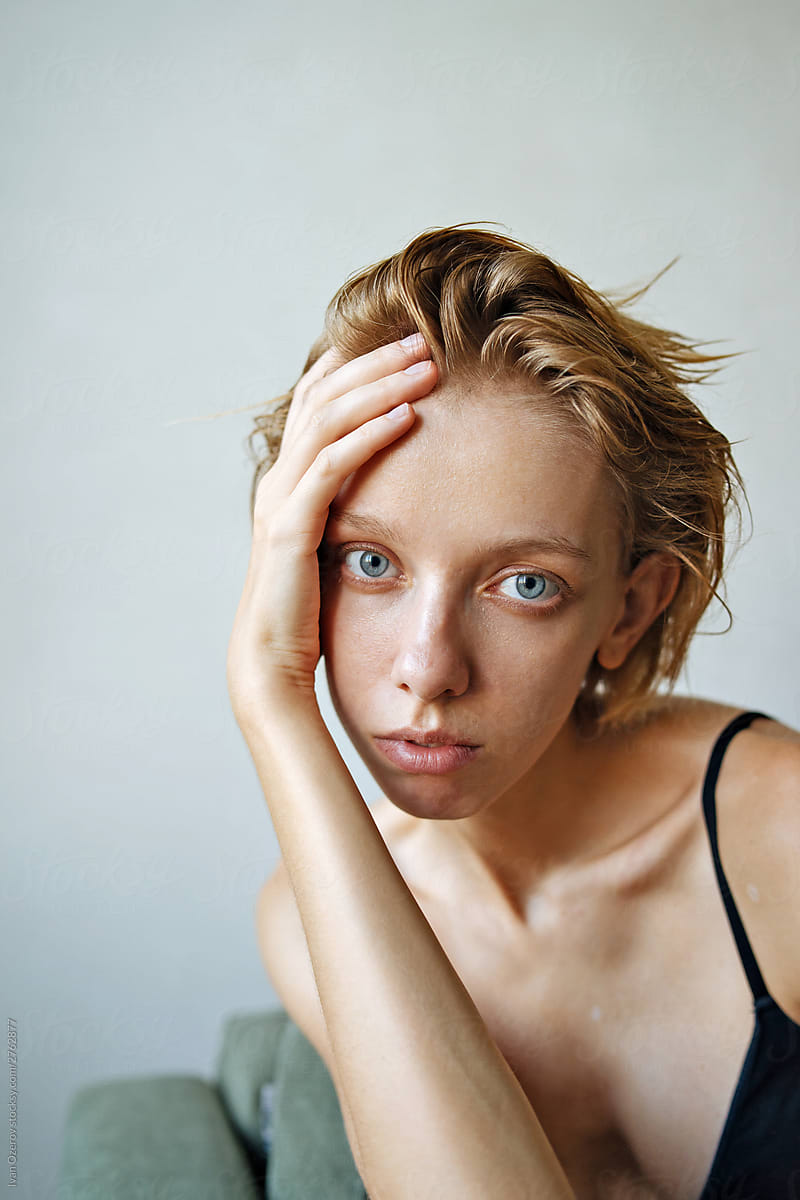 Portrait of a beautiful girl with wet short hair