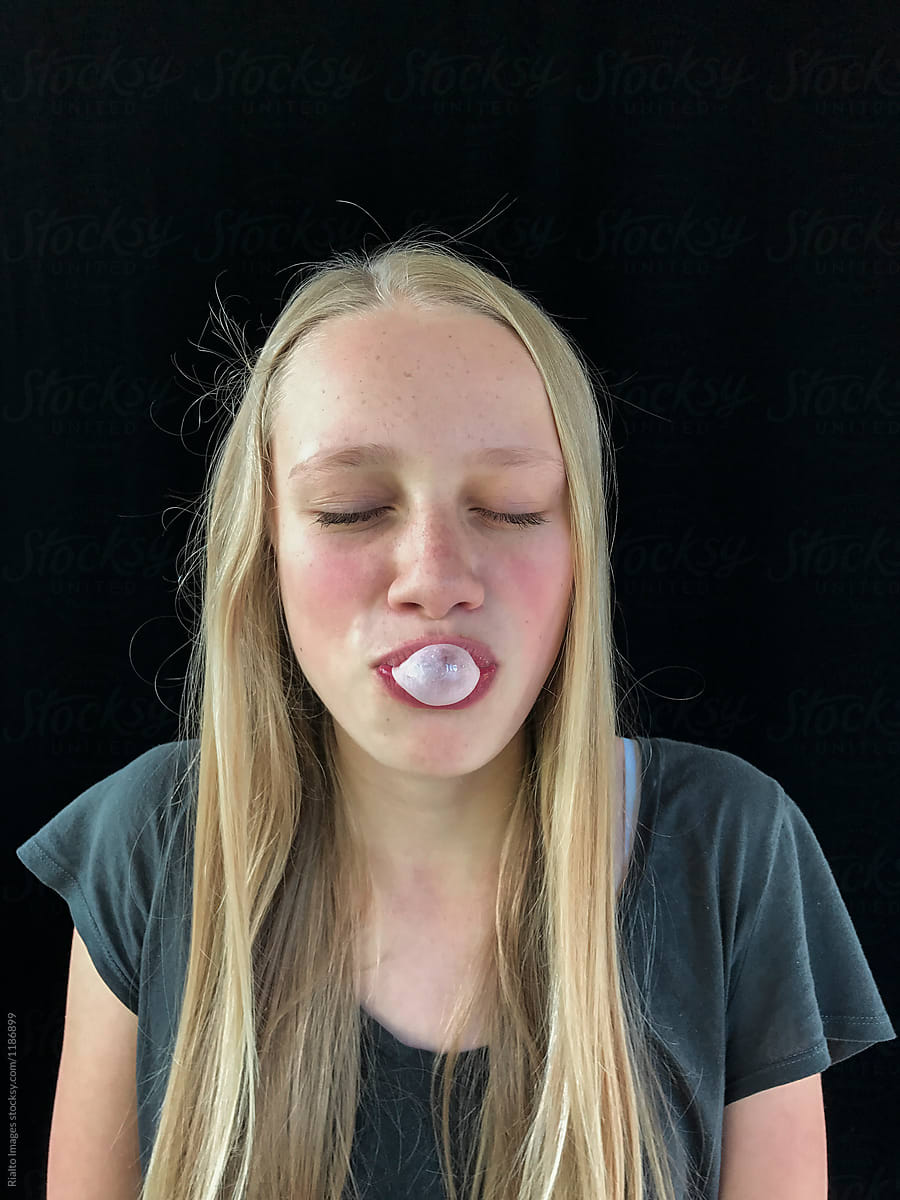Teenage Girl Blowing Bubble Gum Bubble By Stocksy Contributor Rialto Images Stocksy 