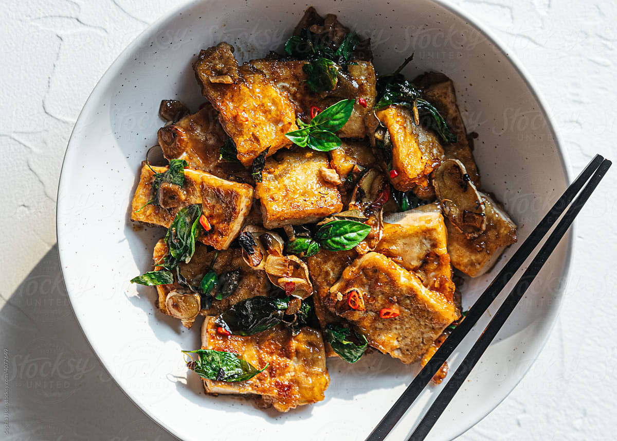 Vegan tofu stir fry in ceramic bowl