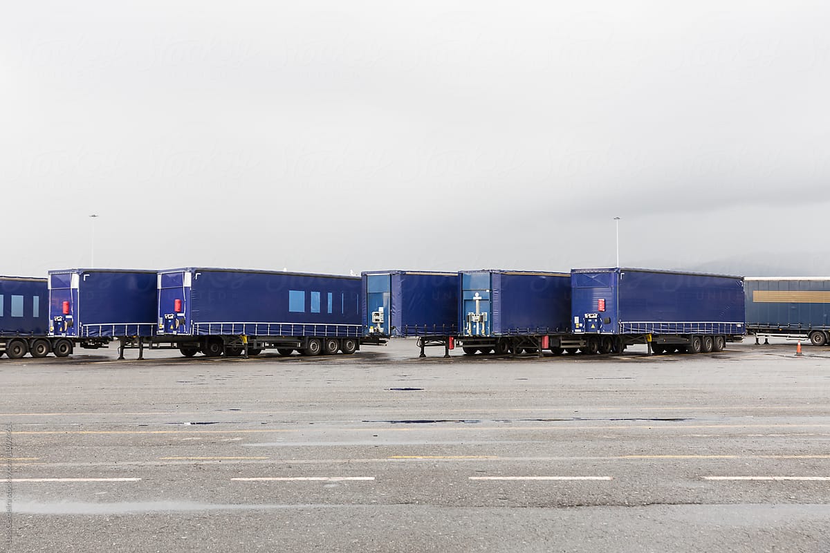 Semi-trailers parked on a road