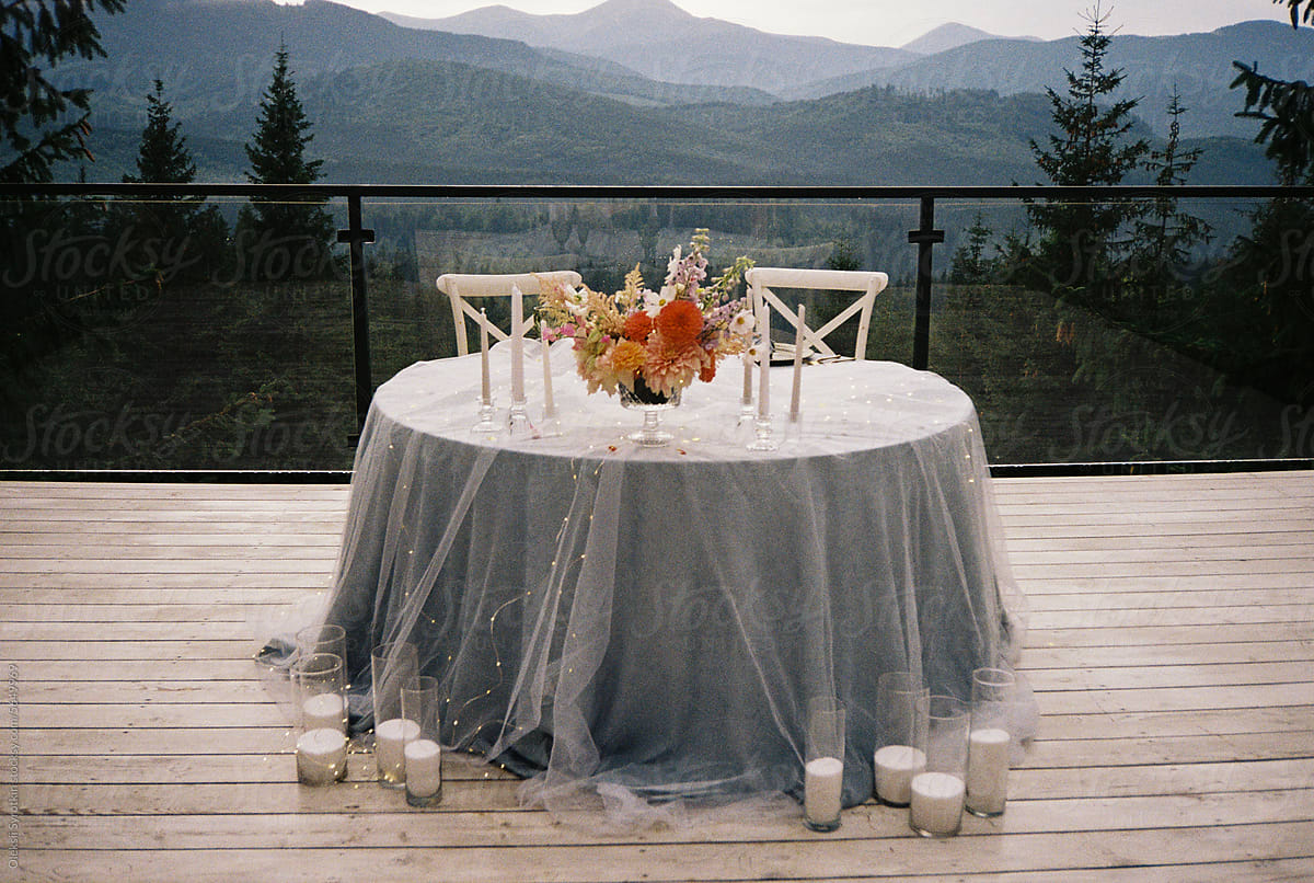 Open-air table decorated for dinner
