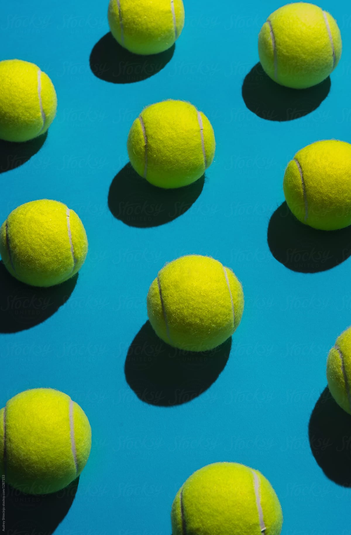 Tennis balls arranged.