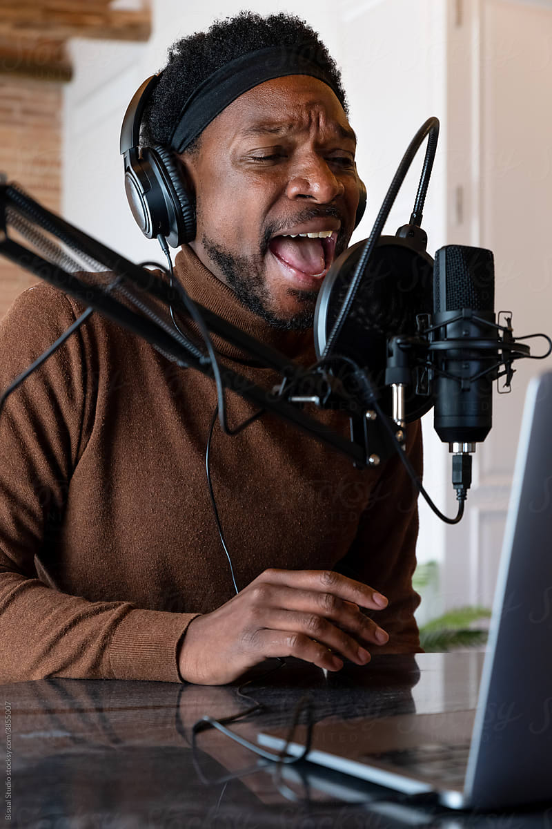 Black blogger singing at home
