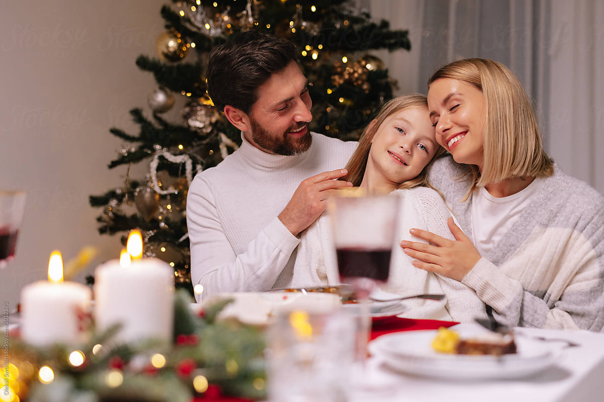 Family  portrait celebrate love embrace  dinner Christmas tree