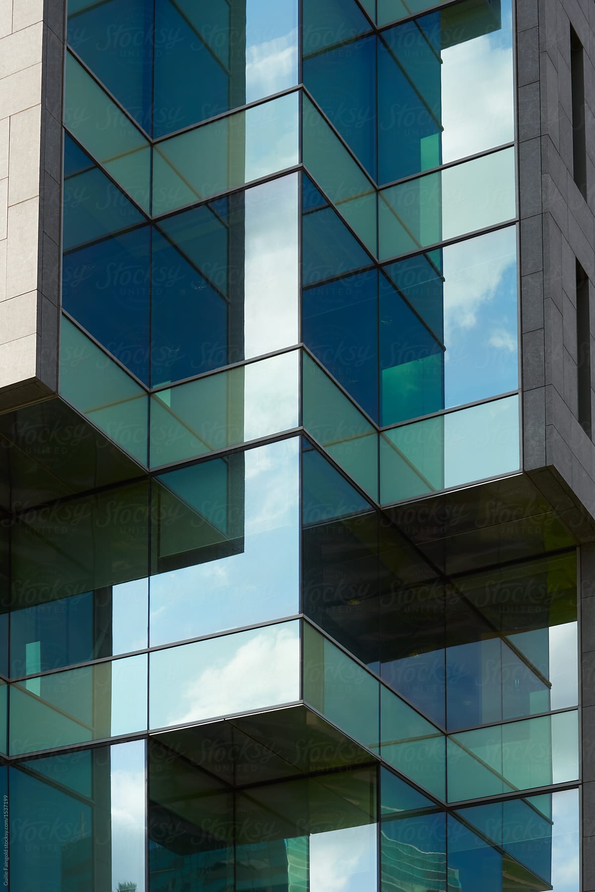 Close-up of glass building exterior.