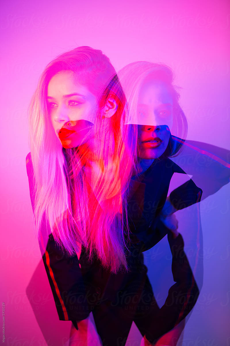 Double Exposure Photo Of A Beautiful Blonde Woman Lit With Blue And 