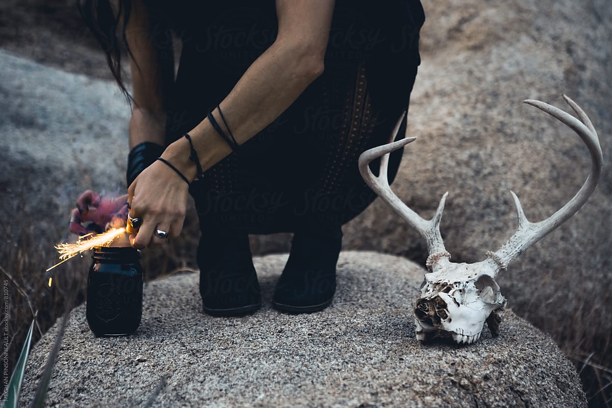 Witchy Woman\'s Feet with Sparks and Deer Skull