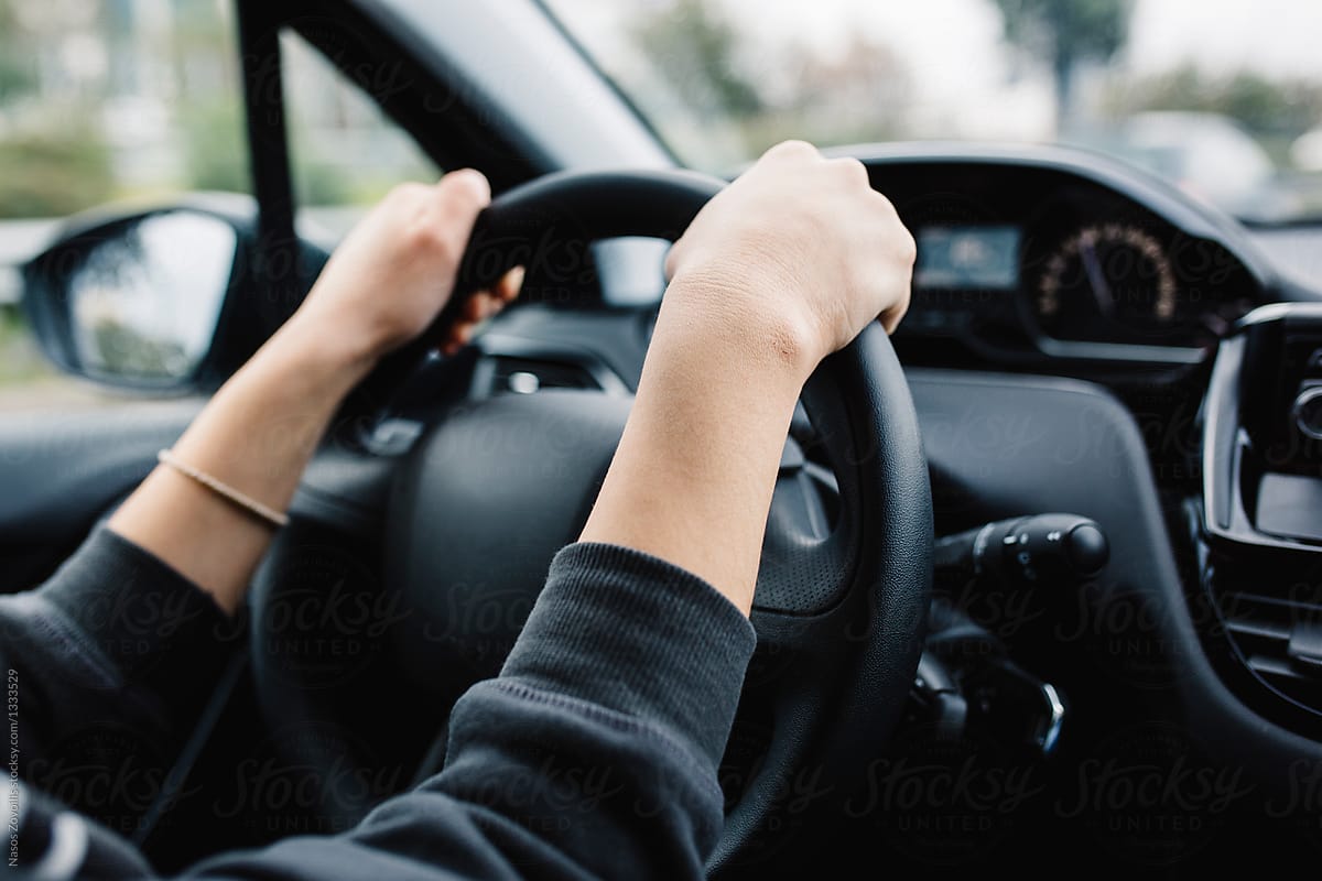 Woman Driving A Car by Nasos Zovoilis - Driving, Hands