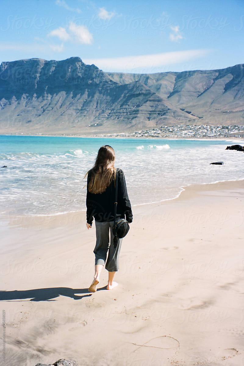 Beach Stroll in Famara, Lanzarote: A Cinematic Moment