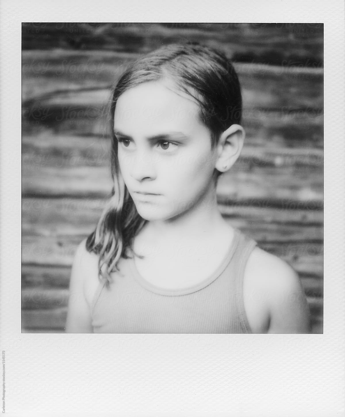 Black And White Instant Photo Of Nine Year Old Girl Del Colaborador